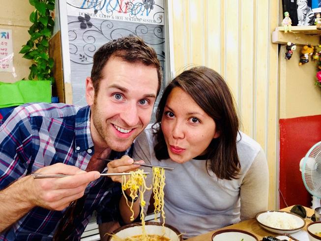 Alyssa and her husband eating noodles