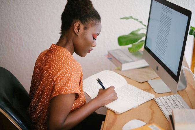 woman working at desktop computer