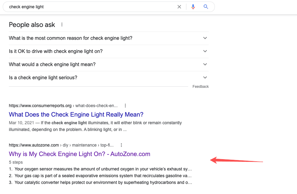 Screenshot of "check engine light" SERP with auto zone result.